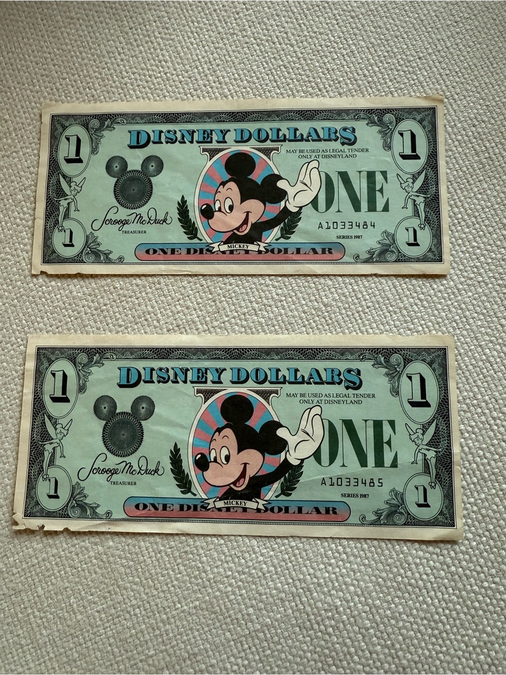 Pair of 1987 Disney Dollars in Sequential Order  - Green and Blue Accents